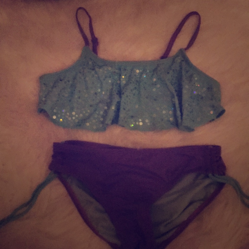 A purple and turquoise bikini